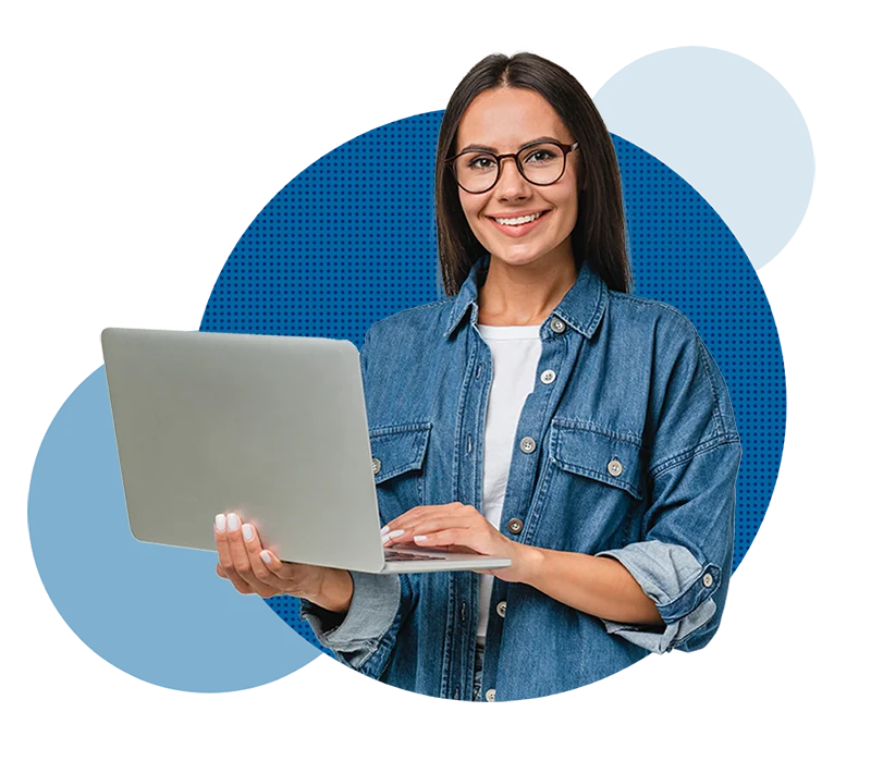 Woman smiling holding a laptop